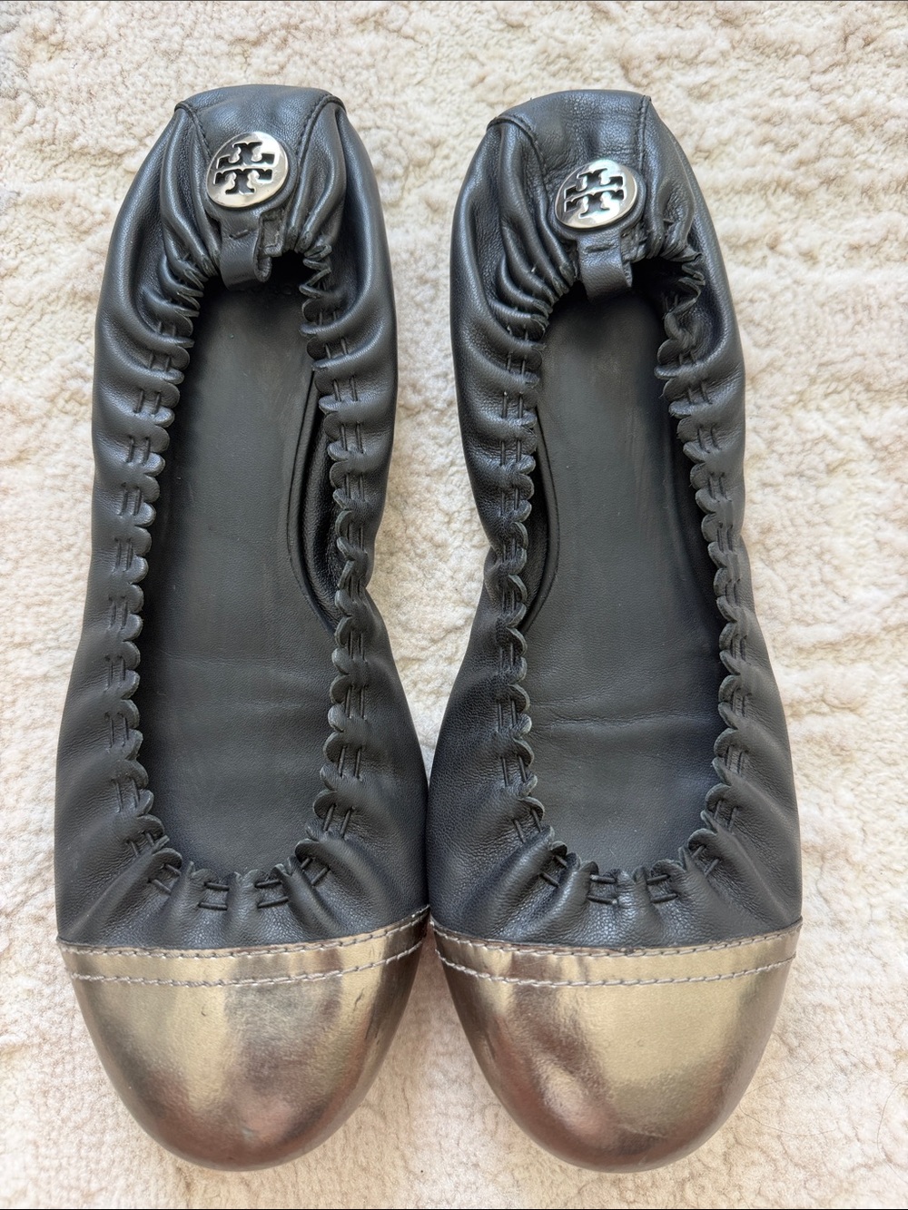 Tory Burch Black Leather Ballet Flats with Metallic Gold Cap Toe